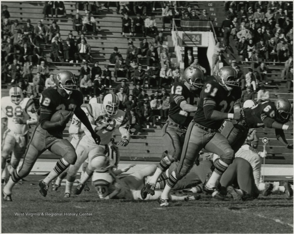 Wvu Football Player Garrett Ford Carries The Ball West