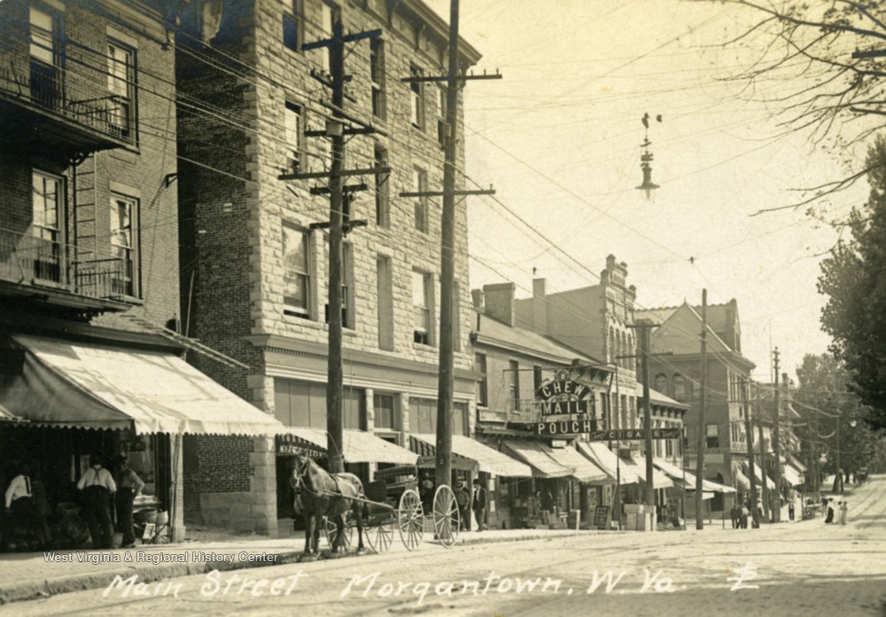 Photograph postcard of Main Street, also known as High Street in Morgantown, West Virginia. See original for correspondence written on the back.