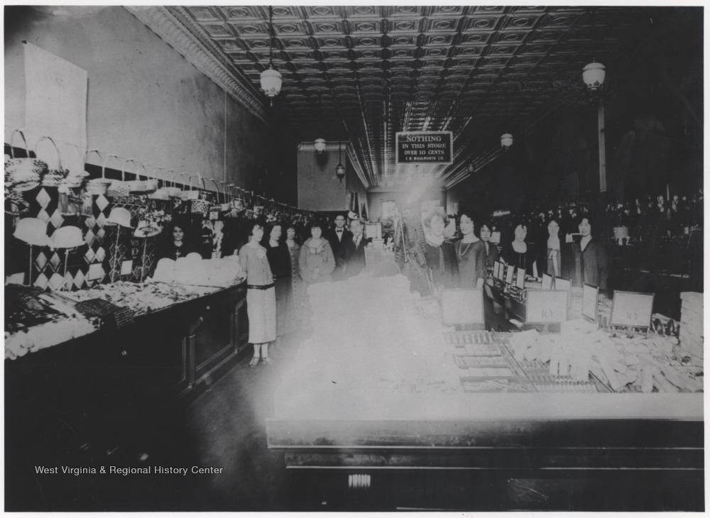 Shoppers pictured inside the department store, where a sign insists that "nothing in this store is over 10 cents."
