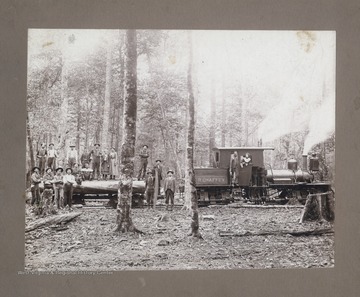 Posing on the 'R. Chaffey' locomotive.  Tucker County.
