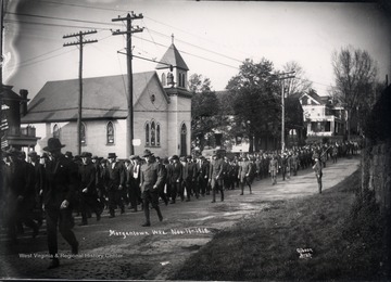 Armistice Day Parade on University Avenue, Morgantown; Purinton House is visible in the background.<br />