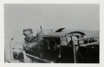 Back, side view of train engine.  