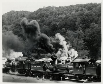 Cass Scenic Railroad.  Two train engines at station.  Original from Earl Palmer.