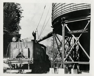 No. 4 takes on a tank of water, and it takes 1,500 gallons of it from nearby Leatherback Creek for each puffing trip up Cheat Mountain, with about 400 thrilled passengers, that is.  The neighboring Chesapeake and Ohio Railway donated the water tank.  
