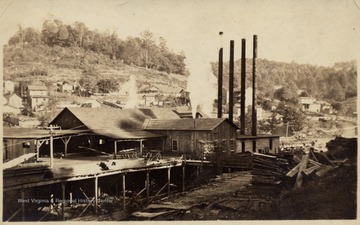 Ranwood Lumber Company Mill.  Four smoke stacks visible.