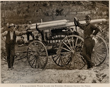 Men standing in front of a Virginia Torpedo Co. wagon carrying nitro-glycerin. From Grant's Photo.  Record of West Virginia.