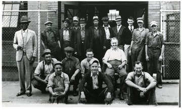 Group portrait of workers outside of the Fostoria Glass Company.