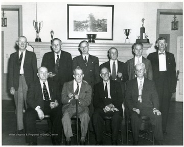 Retired Fostoria Glass Company Workers. Back Row: George Emerich, Thomas Cox, Walter Nesbitt, Russell Shepherd, John H. Williams, Hilman Crow. Front Row: George Patterson, John W. Matrin, Sidney Staley, Edgar Bottome.