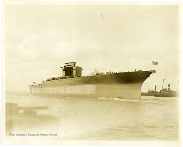The U.S.S. West Virginia floats out into Hampton Roads after being launched at the Newport News shipyard. Afterwards she was outfitted and commissioned in 1923.
