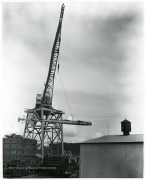 The mast of the U.S.S. West Virginia being loaded at Todd Shipyards in Seattle, Washington. The mast was shipped to Morgantown, West Virginia in February 1961.
