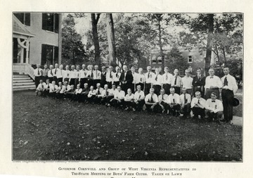 Group portrait of Governor Cornwell and West Virginia Representatives to tri-state meeting of boys' farm clubs. Taken on lawn of executive mansion.