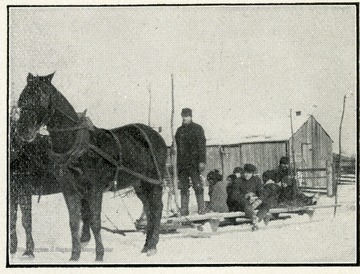 Children being taken to school February 6, 1906.  Five degrees below zero.  A little quicker, but about as cold as if they had walked.