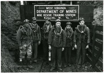 Group portrait of miners in rescue gear at the Mine Rescue Training Station at Kilsyth, W. Va. 