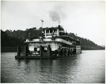 Champion coal tow boat of the Pittsburgh Coal Co. on unknown river.
