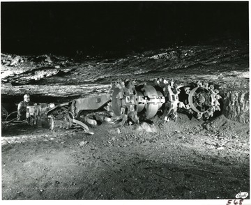 A continuous mining machine operating in a four foot seam.