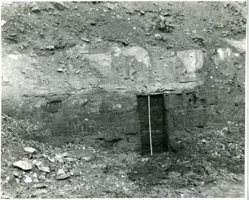 This picture shows the thickness of the coal seam in relation to a normal doorway.