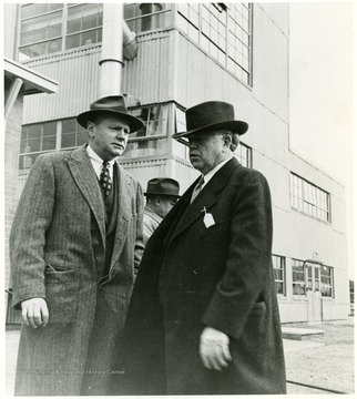 Two coal officials talking outside during a Consolidation Coal Co. Inspection trip.