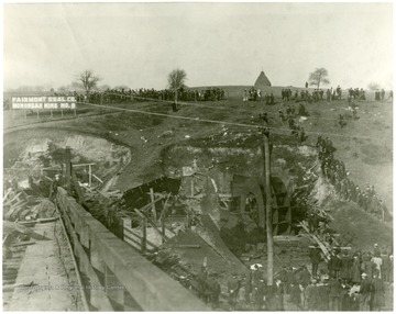 Crowd looks at the destruction in Monongah, W. Va. after explosion.