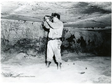 Man tests for gas at the Jamison No. 9 Mine.