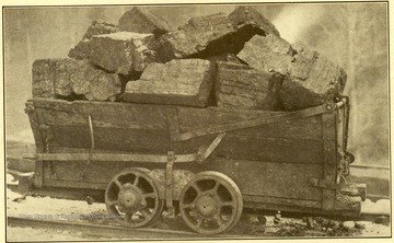 Car filled with coal. 'Geological Survey'