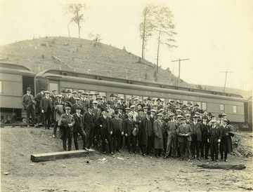 Inspection party standing next to a Pullman train near Somerset Pennsylvania.