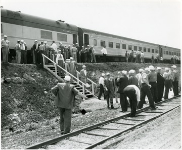 Group of men outside of a New York Central train.