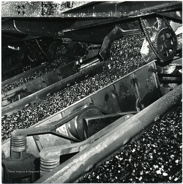 Coal traveling on conveyors. Credit Must Be Given. Not to be reproduced without written license from William Vandivert.