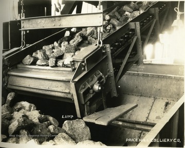 Lump coal coming off a conveyor.