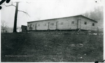 Barracks with tree at Downs, W. Va.