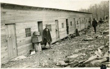 Man exiting barracks at Meriden, W. Va.