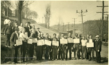 Group of striking miners holding picket signs in Monongah, W. Va.