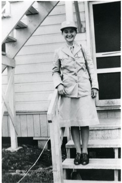 Goldie Zane Brooks on steps of barracks in Ft. Oglethorpe. Director of Settlement House 1942-1943. 