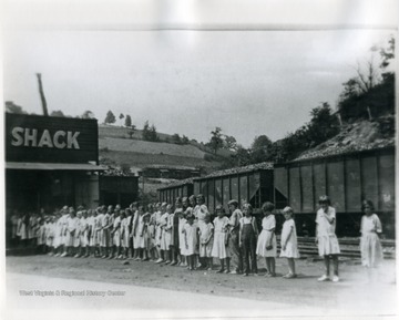 Children standing in front of the Shack at Pursglove, W. Va.; 'For more information on Mountaineer Mining Mission see A&amp;M 2491 (S.C.)'