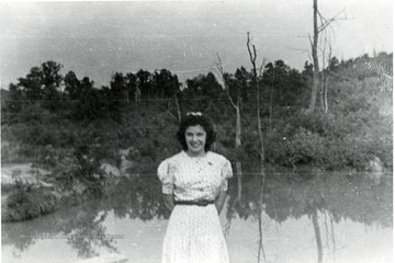 Viola Trubee standing next to water.