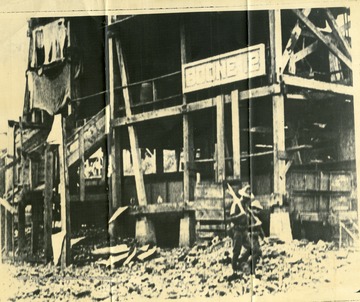 'Do Not Copy.'  Armed soldiers pass in front of Boone Mine No. 12.