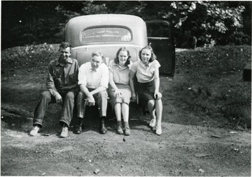 Foster Molisee (left), Bushrod Grimes (2nd from left), Unknown Girl, Miss Burge (Right.)