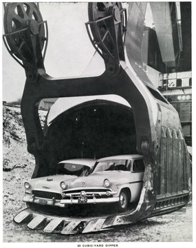 'The Mountaineer,60 cubic yard shovel: the Mountaineer is the world's largest shovel; it is the largest unit of mobile land machinery ever constructed in this country. It will be used to remove earth and rock overburden, with a maximum average of 90 feet in depth (under favorable contour conditions, the machine will be able to go to a top maximum of 120 feet of overburden), from the 4 1/2 foot Pittsburgh coal seam in Eastern Ohio. Although the four large machines which Hanna has had in service for several years at its open-cut mines are among the largest ever built, they are not capable of removing overburden averaging as much as 90 feet in depth. The Mountaineer makes possible the recovery of millions of tons of coal not recoverable with the smaller machines.'