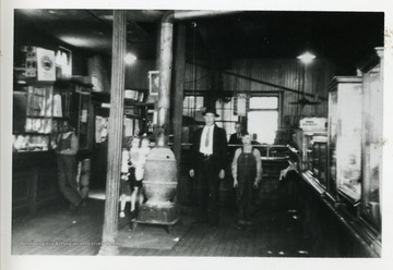 Visitors or workers standing in the Fire Creek Coal and Coke Co. store.