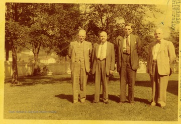 Dr. C.E. Lawall, (far right), Past President of WVU, is pictured with Robert H. Morris, H.P. Musser, and Elliott Vawter.