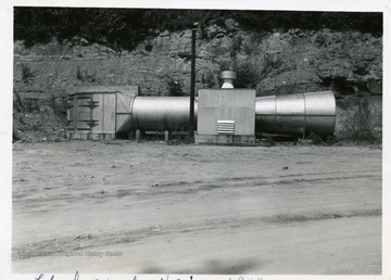 Coal mining equipment at Williams River Mine, Webster County, W. Va. Gauley Mountain Coal Company, Ansted, W. va. 'Taken by mechanization' written on the front of the photograph.