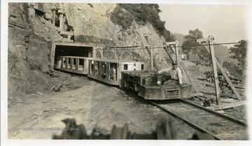 Coal miners riding in shuttle cars, exiting the Williams River Mine, Webster County, W. Va. 