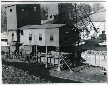 Tipple loading coal mining cars are shown. 