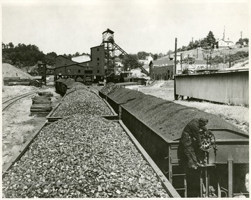 Large trainline of coal cars. New River Co., Mt. Hope, W.Va., Summerlee Mine.  Summerlee, W.Va.  'C.H. Sprague + Son, 10 Post Office Square, Boston, Mass.'