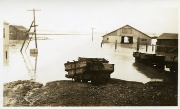 Mule barn and surrounding buildings are flooded.