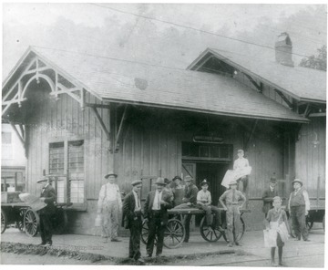 People outside C&amp;O railway passenger and express depot (Adams Express Co.)