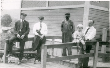 Telegrapher W.L.Knopp stands on right. Tower was known as "AD Cabin" and controled train movements between Ronceverte and Hinton. Twenty switches to Alderson sidings were operated here.