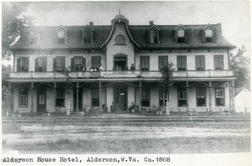 'The Alderson House Hotel was built at Alderson, West Virginia (Monroe County) in 1882 by Messrs. David J. Cogbill and John W. Alderson. It was located in close proximity to the main line iron of the Chesapeake [and] Ohio Railway. It was the most modern hotel in the state of West Virginia on the C [and] O line when it was built, having 26 rooms and two annexes, adding about 15 rooms. It was the first building in Alderson to have running water in every room, it being supplied from a 7,000 gallon tank located just above the third story of the hotel. It recieved much praise from Virginia Newspapers in the '80's who always referred to it as the best and most famous house on the C and O in West Virginia except for the White Sulphur Hotel. In addition to the regular guests and boarders, two C [and] O passenger trains each day stopped for meals in the hotel's dinning room. One express passenger train stopped for breakfast and one for supper, there being about 200 people from the steamcars taking meals in the fine dinning room. The Alderson House took over the passenger business which had from 1872 to 1882, been handled by the Monroe House Hotel, which was located across the street on the other side of the rails.  The Alderson House continued as a eating stop on the C [and] O until the middle 1890's and after that became principally a summer resort. By 1896 the town of Alderson had huge swarms of people coming in from the Virginia and Ohio cities to spend the summer in the cool, pleasant mountains. This traffic reached a height about 1900. By 1912 there were few summer boarders. During this period the Alderson House got more than its share of the trade. It continued as a popular stop until the 1930's when rail travel slowed down considerably. The hotel operated under many different managers after Mr. J.W. Alderson gave up the management in 1905 and did not close down until 1961. Compiled by Thomas W. Dixon, Official Historian to the Municipal Government of the Town of Alderson, Inc.'