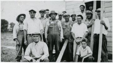 Group portrait of volunteer workers. 'Summer 1936, Members, PMWA L.U. - Volunteers working in Mt. Olive Miners Cemetary on Mother Jones Martyrs Memorial Project.' 