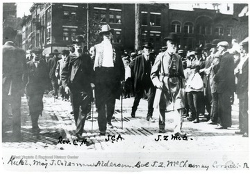 J. Coleman Alderson and others in the streets of Charleston. Col. J. Z. McChesney is on his right.