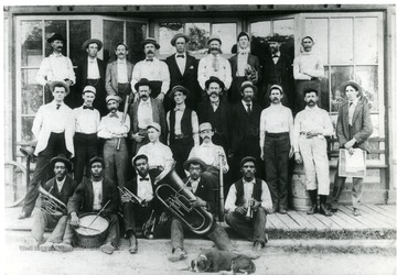 Band and Baseball team stand for a portrait.